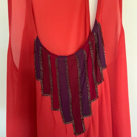 Sleeveless sheer blouse with beaded pattern at neck - Picture 2 of 6